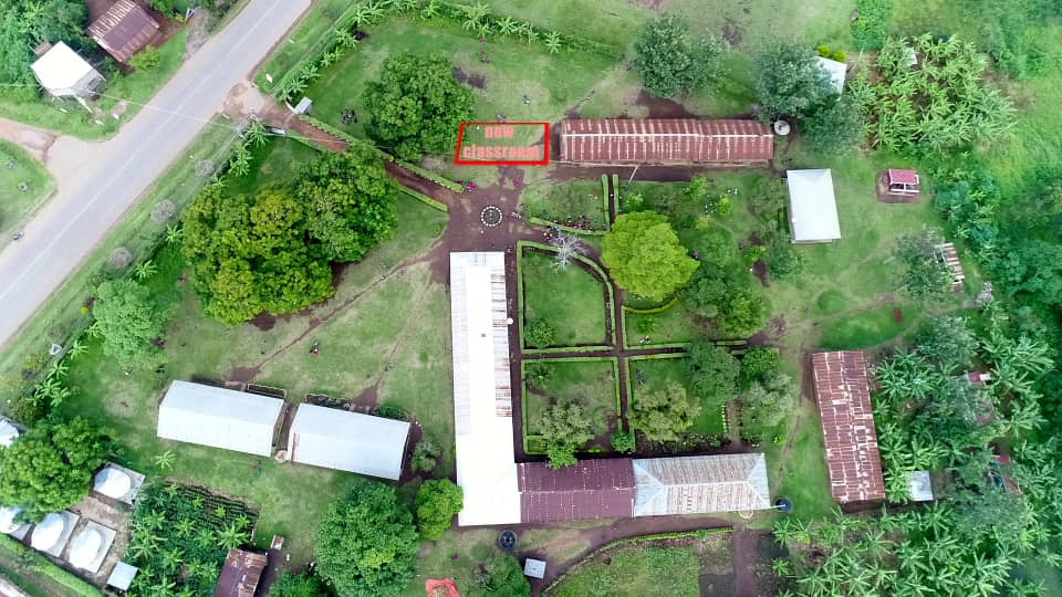 Aerial view of Rubona Primary School with the site of the new classroom outlined in red.