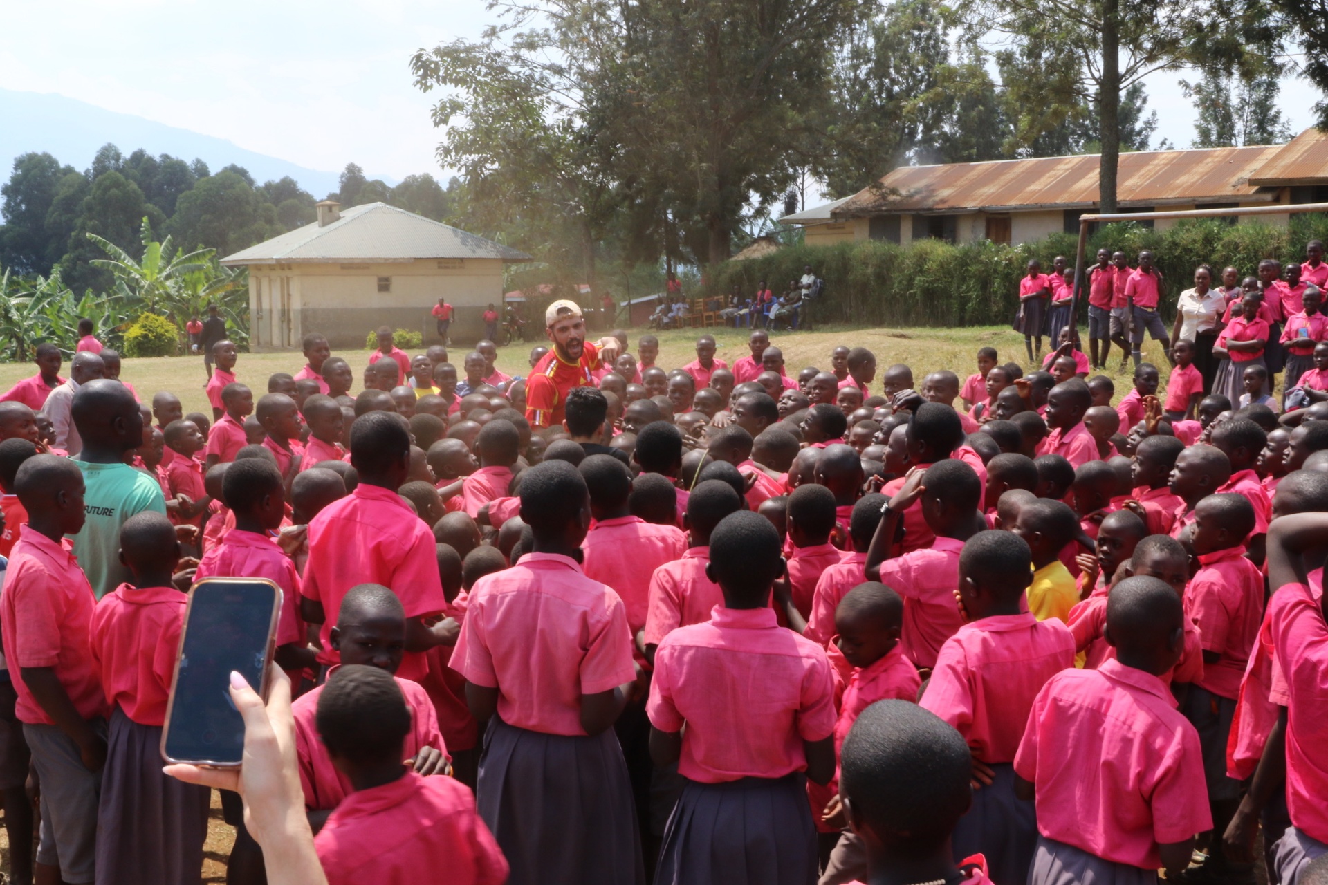 A large group of Rubona Primary School students gathered together.